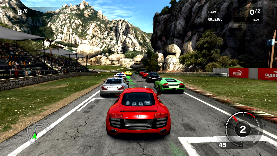 Forza Motorsport 3 an Audi chases the pack at the beginning of a race in the mountains
