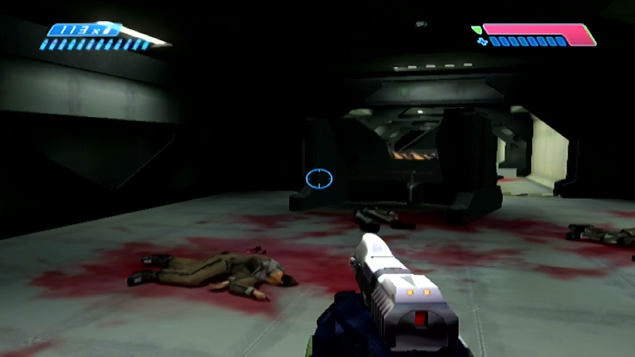Halo Xbox Chief stands with pistol drawn around a load of bodies